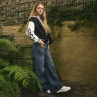 Jeansowe spodnie wide z ozdobnymi przeszyciami Cool Club