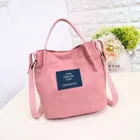 Materiałowa torebka listonoszka, różowa