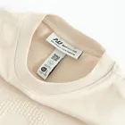 Beżowy t-shirt o kroju relaxed NOWEAR