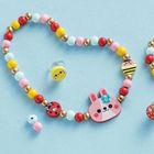 Janod, Ogród kwiatów, zestaw kreatywny do tworzenia biżuterii z drewna