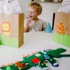 Jolly Designs. Krokodyl. Podróżna książeczka sensoryczno-manipulacyjna