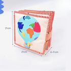 Jolly Designs. Dookoła Świata. Książeczka sensoryczno-manipulacyjna