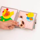 Jolly Designs. Lew. Książeczka sensoryczno-manipulacyjna