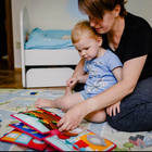 Jolly Designs. Szczęście. Książeczka sensoryczno-manipulacyjna