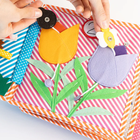 Jolly Designs. 1 2 3. Książeczka sensoryczno-manipulacyjna