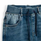 Jeansowe spodnie o kroju jogger z regulacją Cool Club