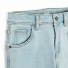 Jeansowe spodnie z regulacją o kroju flare Cool Club