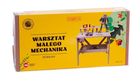 Malowany Las, drewniany warsztat mechanika z narzędziami i klockami