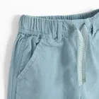 Niebieskie spodnie z cienkiego jeansu Cool Club