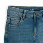 Regulowane spodnie jeansowe flare z przetarciami Cool Club