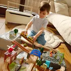 Smiki, drewniane tory z elektryczną kolejką i pojemnikiem