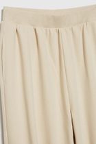 Spodnie dresowe damskie, beżowe, Moodo