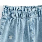 Spodnie jeansowe w kwiaty wide leg Cool Club