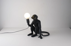 Stylowa lampa stołowa, małpka siedząca