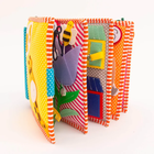 Jolly Designs. 1 2 3. Książeczka sensoryczno-manipulacyjna