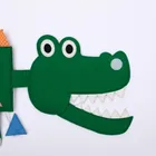 Jolly Designs. Krokodyl. Podróżna książeczka sensoryczno-manipulacyjna