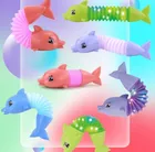 Maksik, Pop Tube, delfin, świecący gniotek, 1 szt.