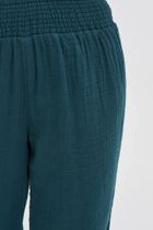 Spodnie materiałowe damskie, zielone, Moodo