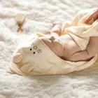 BabyOno, okrycie kąpielowe bambusowe z kapturkiem, kremowe, 100-100 cm