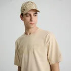 Beżowy t-shirt o kroju relaxed NOWEAR