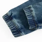 Jeansowe spodnie jogger z regulacją Cool Club