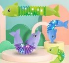 Maksik, Pop Tube, delfin, świecący gniotek, 1 szt.