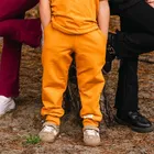 Spodnie dresowe dziecięce, musztardowe, Eevi