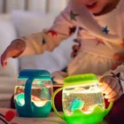 Glo Pals, słoik sensoryczny do napełnienia wodą, zielony