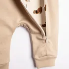 Kombinezon przejściowy chłopięcy z kapturem, beżowy, Nicol