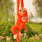 Lean Toys, małpka z dzieckiem, maskotka interaktywna, pomarańczowa, 70 cm