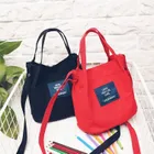 Materiałowa torebka listonoszka, różowa