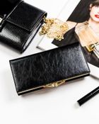 Portfel, czarny, skórzany, wężowy wzór, Peterson