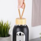 Vilde, butelka na wodę, szklana z silikonowym pokrowcem, czarna, 1l