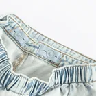 Jeansowe spódnico-spodenki z plisami Cool Club