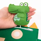 Jolly Designs. Krokodyl. Podróżna książeczka sensoryczno-manipulacyjna