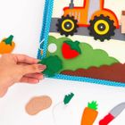 Jolly Designs. Zawody. Książeczka sensoryczno-manipulacyjna