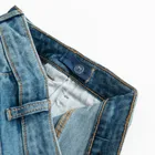 Regulowane spodnie jeansowe flare z przetarciami Cool Club