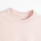 Różowy t-shirt o kroju cropp boxy NOWEAR