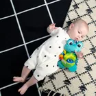 Baby Einstein, żółwik pluszowy sensoryczny do wózka z zaczepem