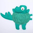 Jolly Designs. Dinozaur. Podróżna książeczka sensoryczno-manipulacyjna