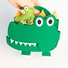 Jolly Designs. Krokodyl. Podróżna książeczka sensoryczno-manipulacyjna