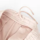 Różowe spodnie dresowe o kroju baggy NOWEAR