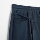 Granatowe spodnie dresowe unisex z kieszeniami cargo NOWEAR