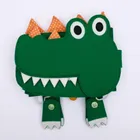 Jolly Designs. Krokodyl. Podróżna książeczka sensoryczno-manipulacyjna