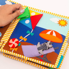 Jolly Designs. Podróżnik. Książeczka sensoryczno-manipulacyjna