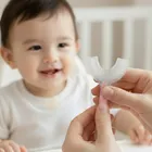 Bocioland, szczoteczka silikonowa w kształcie litery U do zębów, różowa