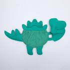 Jolly Designs. Dinozaur. Podróżna książeczka sensoryczno-manipulacyjna