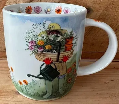 Alex Clark, kubek, Kobieta w ogrodzie z kwiatami