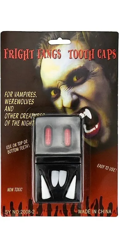 Kły wampira z fiolkami krwi