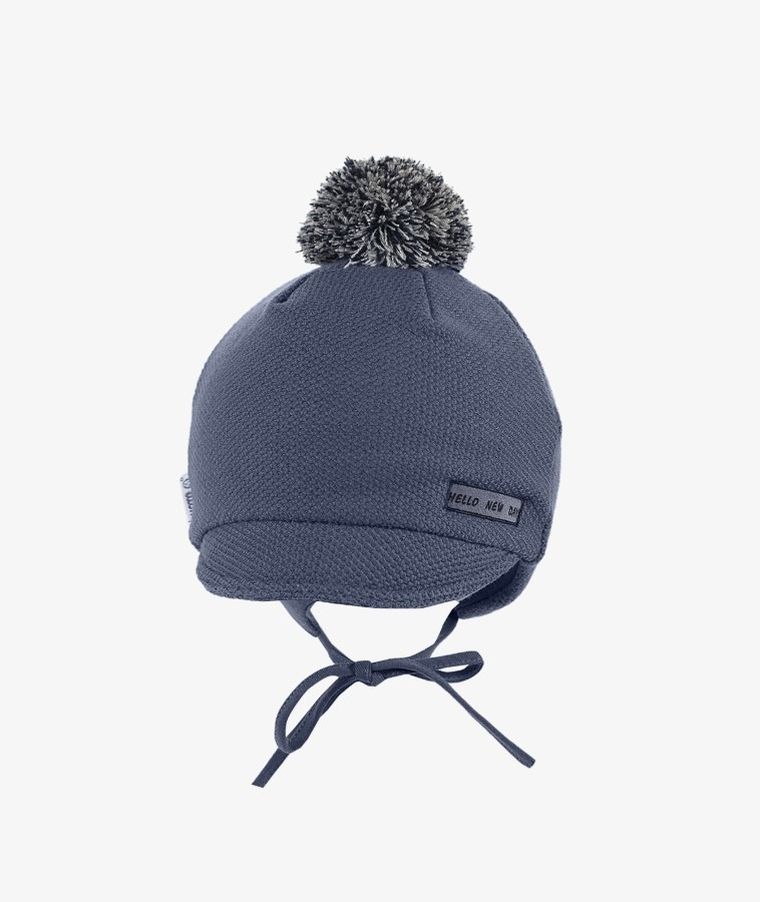 Czapka chłopięca z pomponem, wiązana, granatowa, Iltom